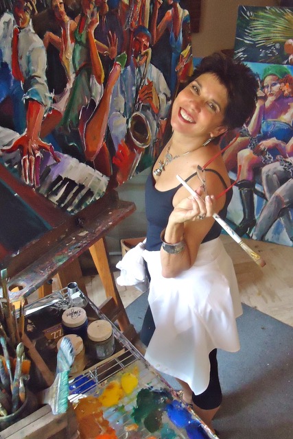 Kathleen working in her studio on a new painting
